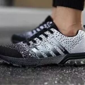 KEEP RUNNING. NWOT. Black & White Sneakers. Euro Size 47. In original ba…